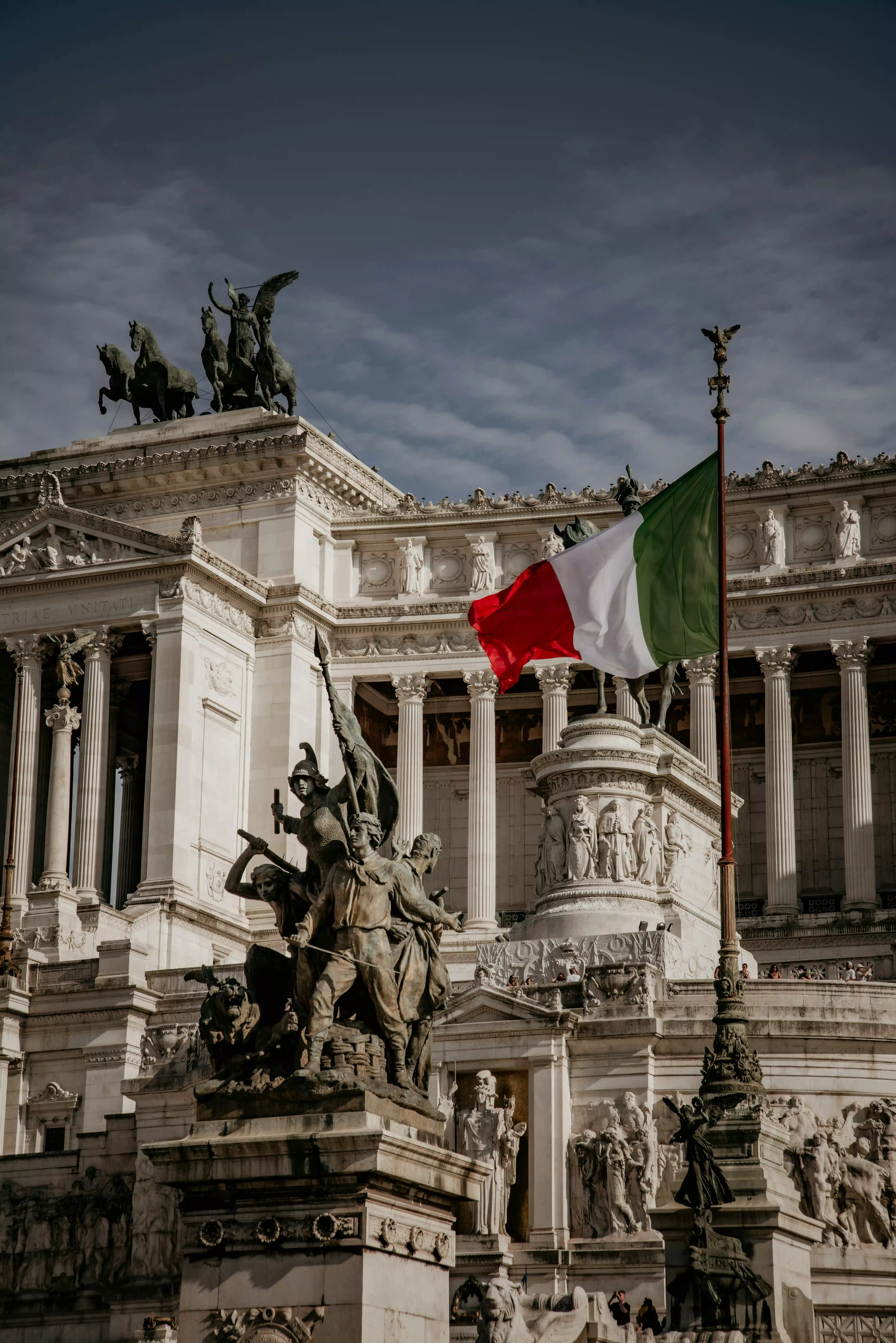 Person holding a visa smiling